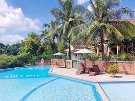 Outdoor pool, pool umbrellas, pool loungers