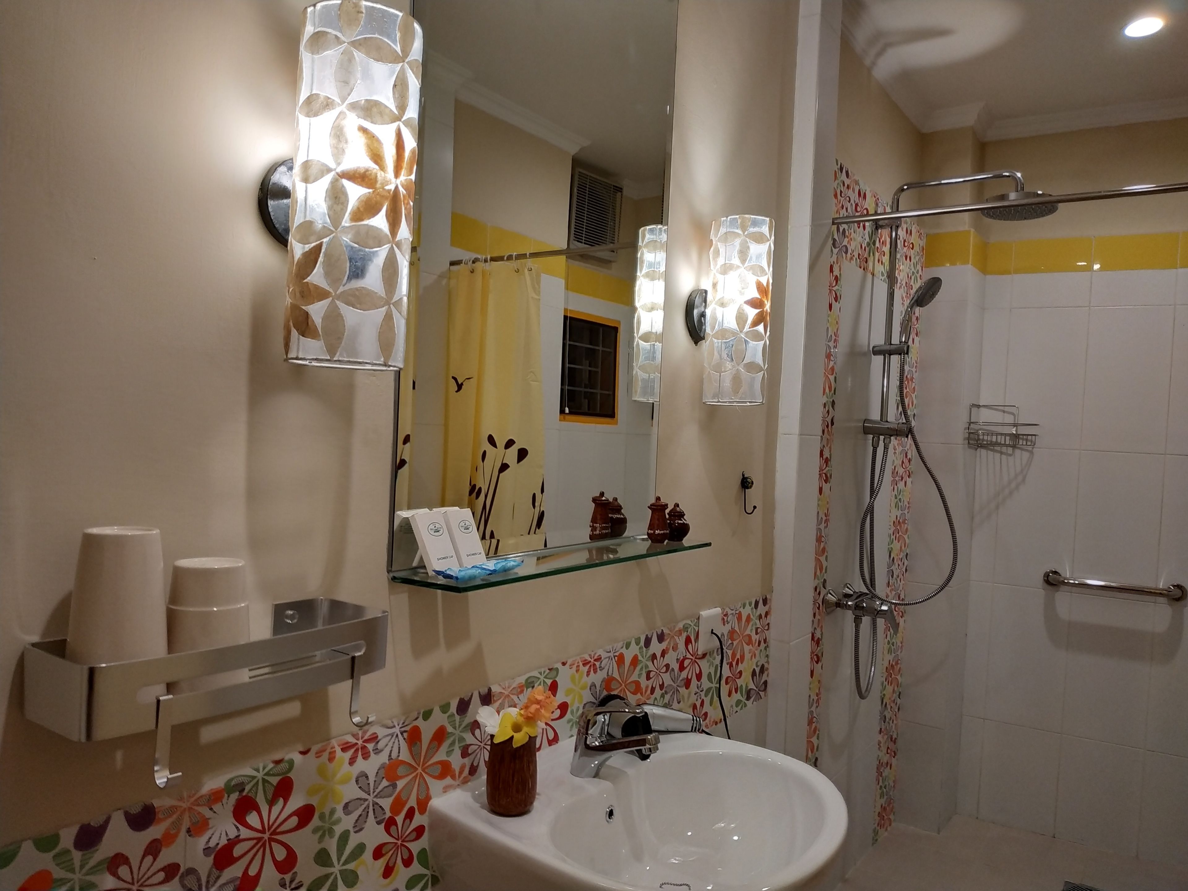 family room, 1 bedroom, garden view | bathroom | shower, rainfall showerhead, free toiletries, hair dryer