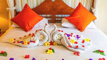 Premium bedding, down comforters, pillowtop beds, in-room safe