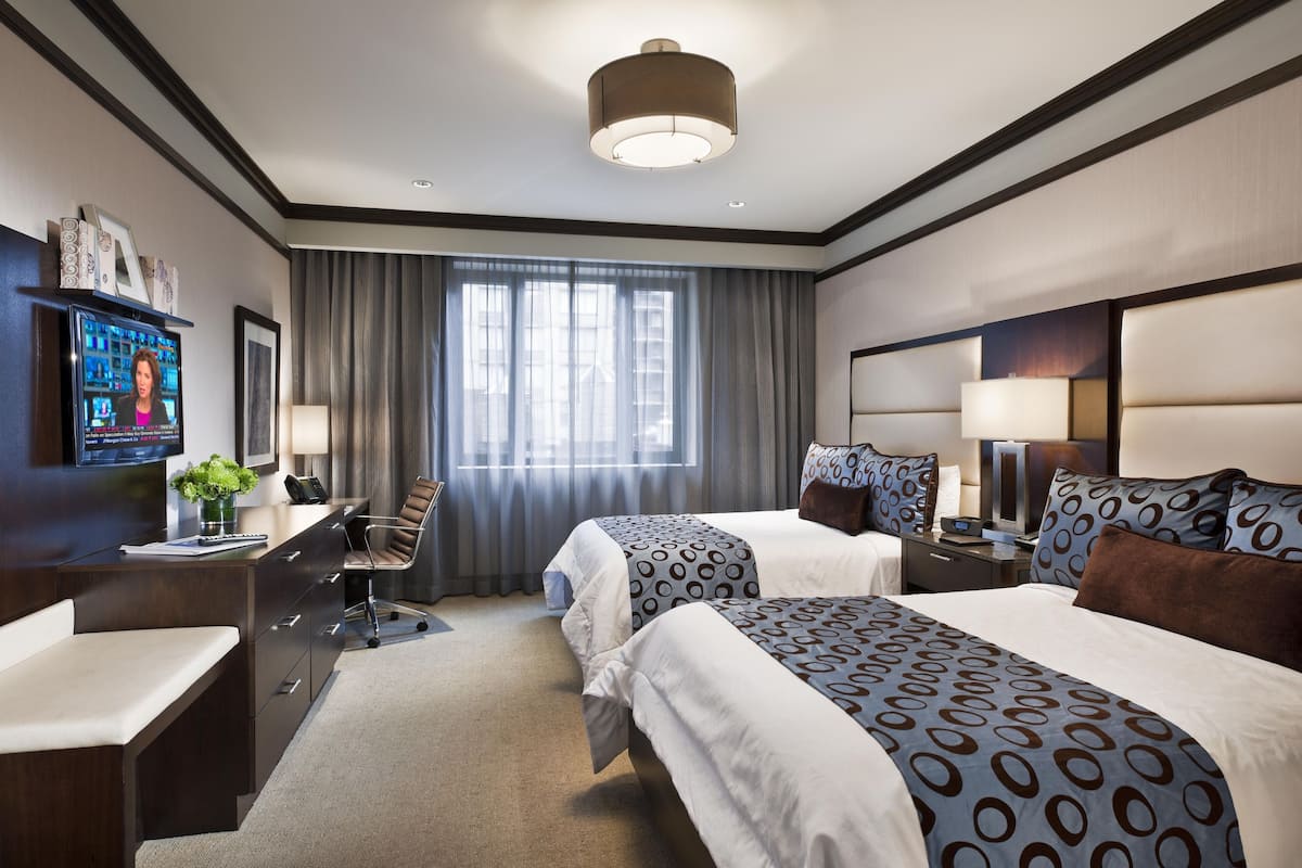 deluxe double room, 2 double beds | premium bedding, pillow-top beds, in-room safe, desk