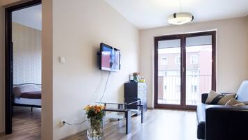 Apartment, 1 Bedroom | Living area | LCD TV