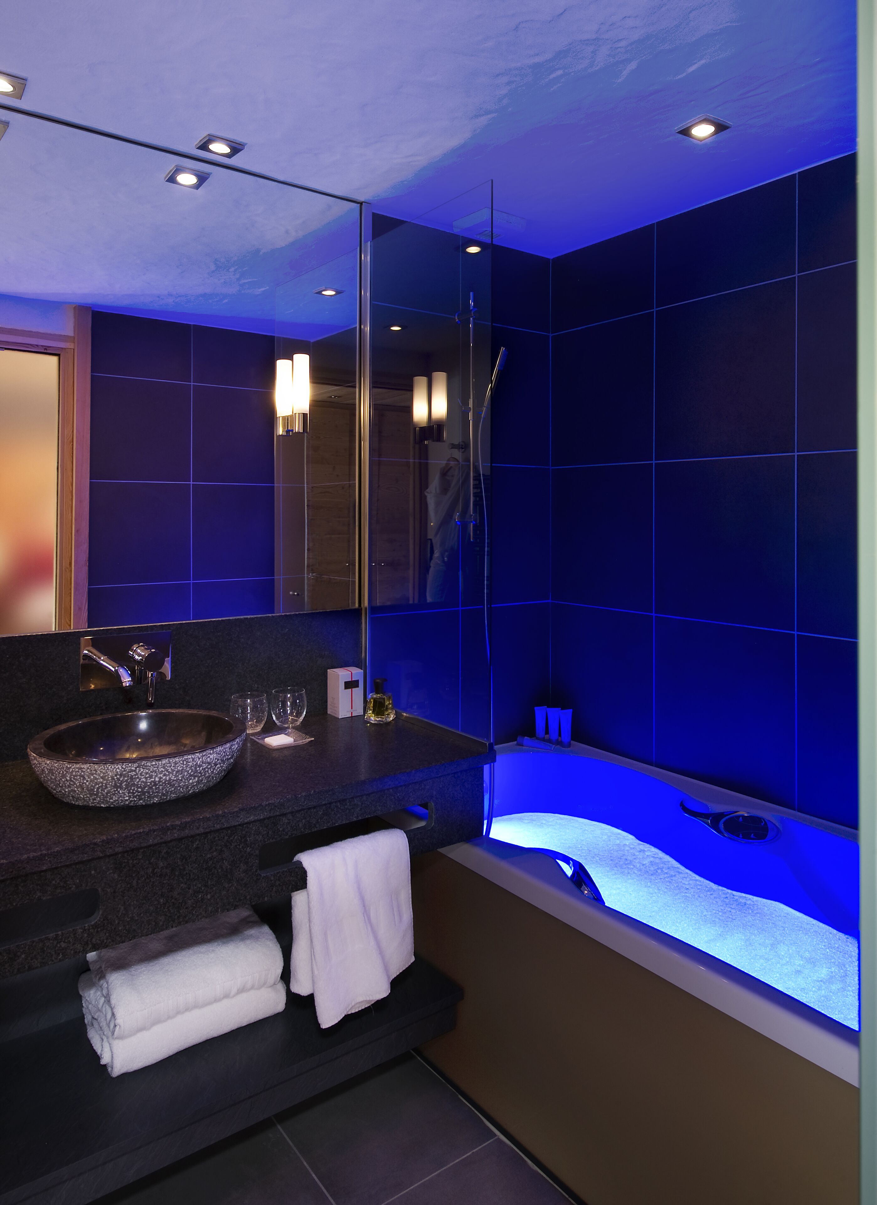 hair dryer, bathrobes, slippers, towels