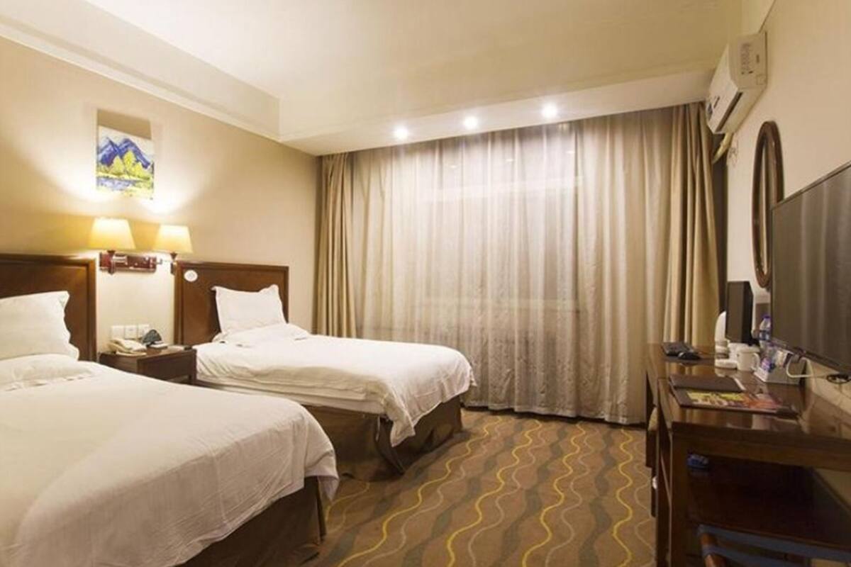 In-room safe, desk, blackout curtains, iron/ironing board (on request)
