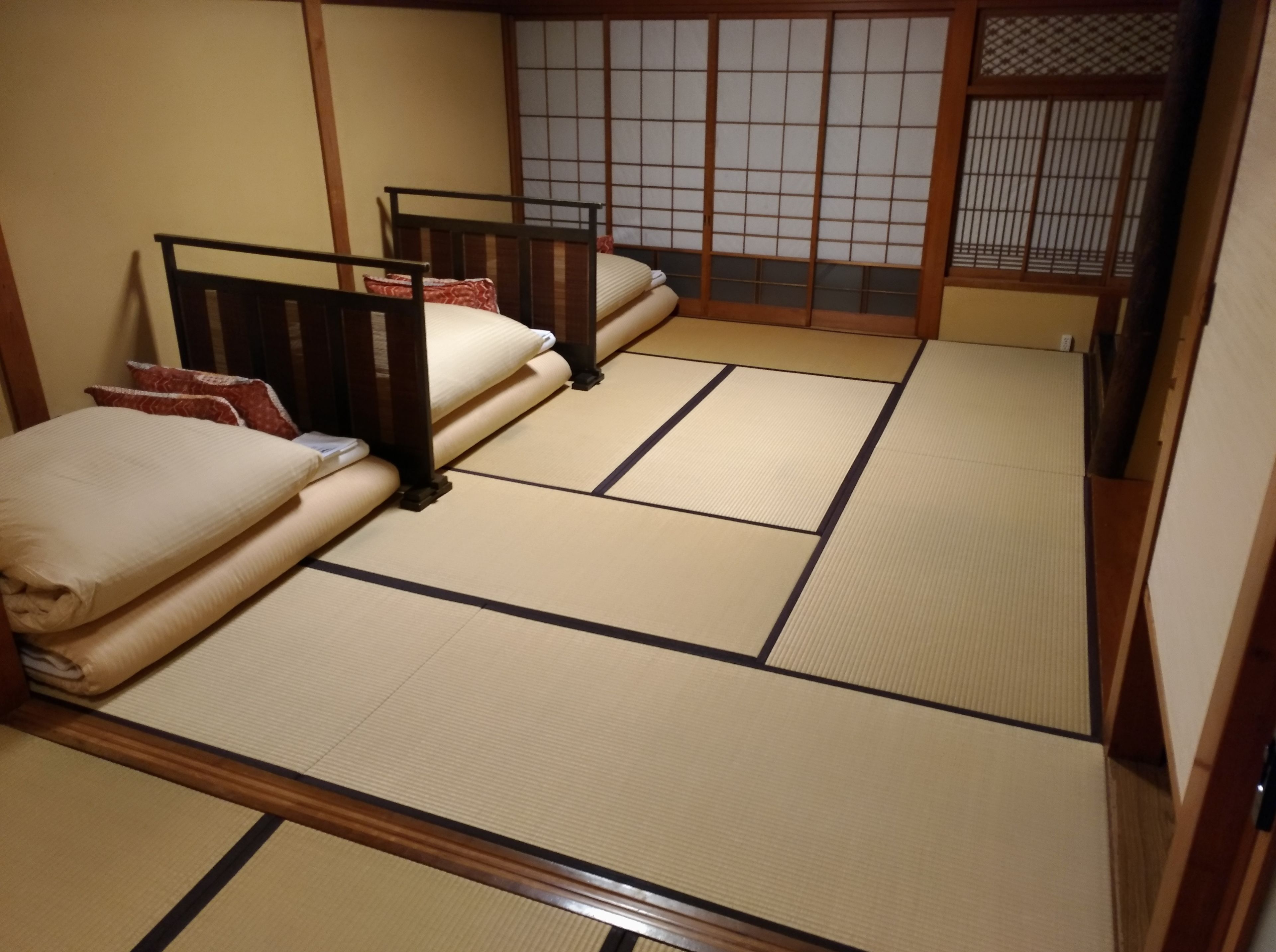 double size japanese futon in mix dormitory, river view | down duvets, in-room safe, individually decorated