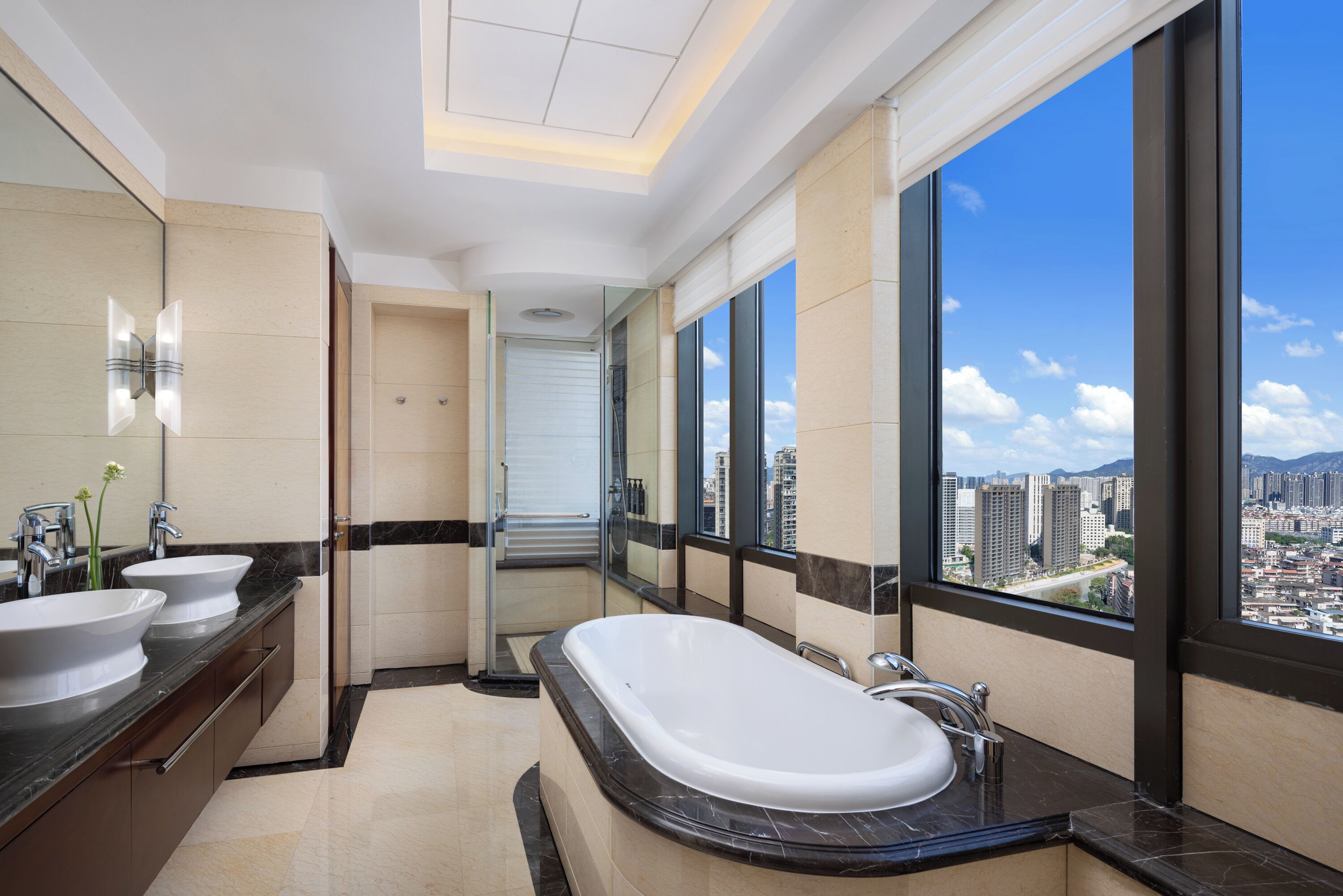 separate bathtub and shower, designer toiletries, hair dryer, bathrobes