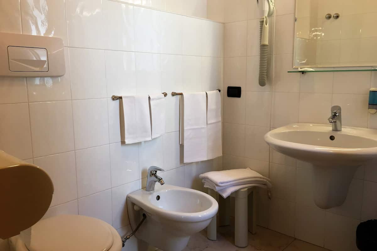 quadruple room | bathroom | shower, rainfall showerhead, free toiletries, hair dryer