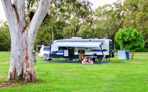 Powered Camping Site Riverwalk - No bedding provided, bring your own Tent, Caravan etc | 2 bedrooms, premium bedding, cots/infant beds, bed sheets