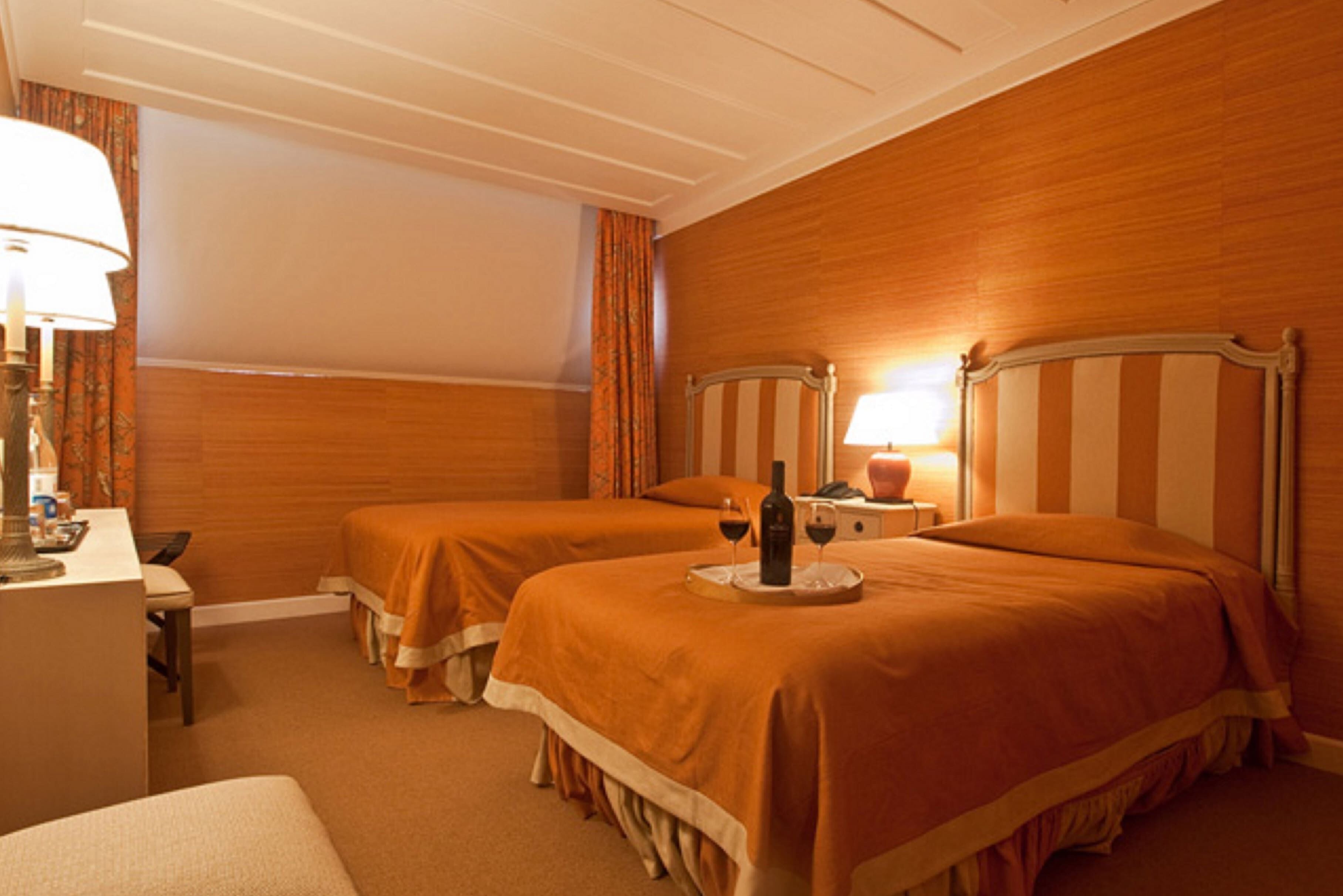 Premium bedding, memory-foam beds, minibar, in-room safe