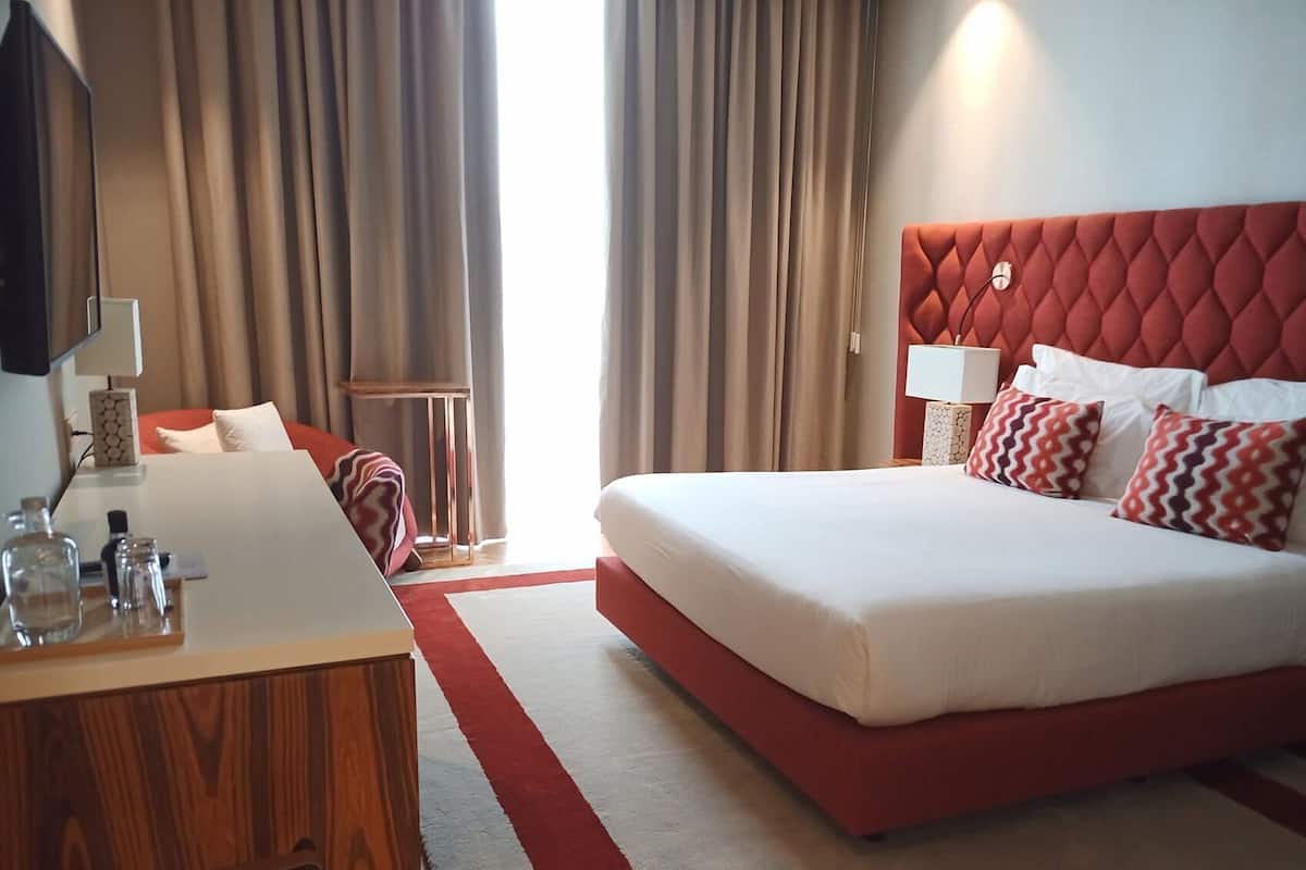 Premium bedding, memory-foam beds, minibar, in-room safe