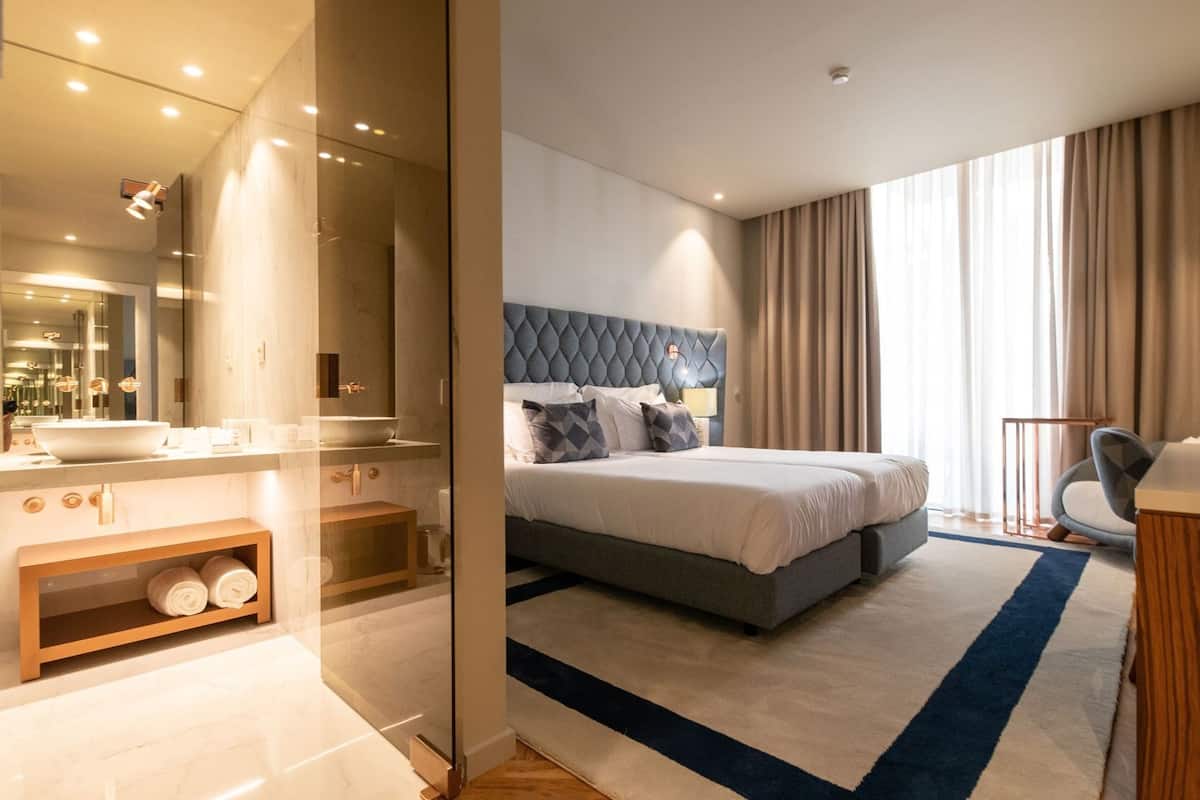 Premium bedding, memory-foam beds, minibar, in-room safe