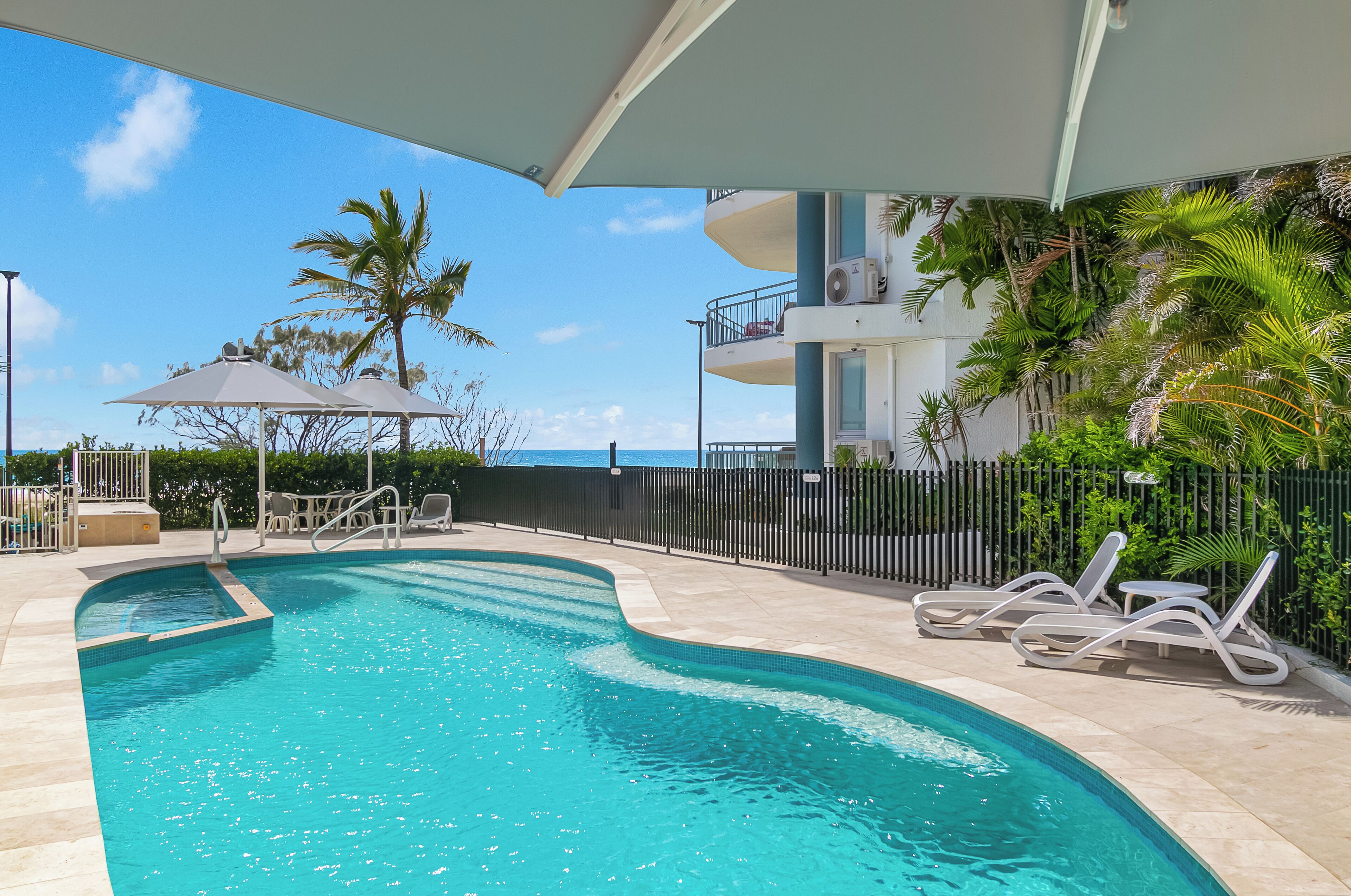 Outdoor pool, pool umbrellas, pool loungers