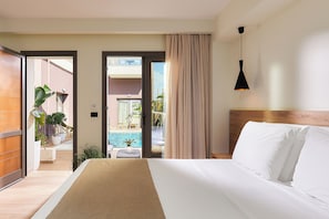 A hotel room with a bed, a view of a swimming pool, and a balcony with plants. - Dionisos Hotel (Hersonissos)