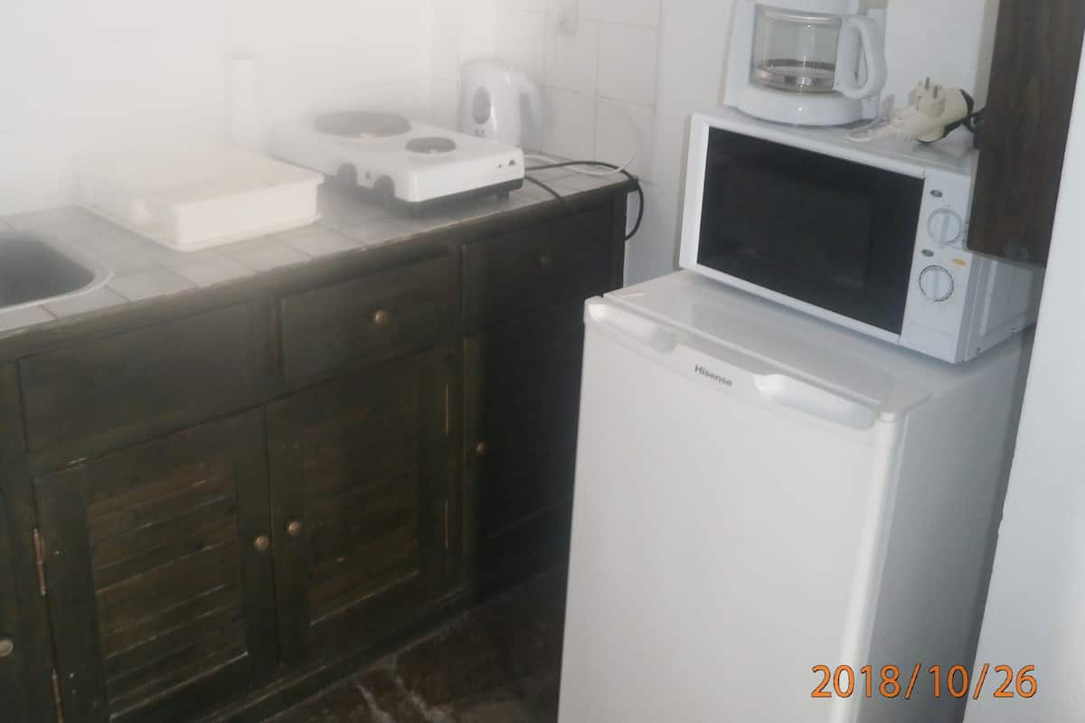 Apartment, 2 Bedrooms | Private kitchen | Stovetop, coffee/tea maker, electric kettle, cookware/dishes/utensils