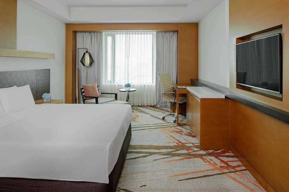 Premium bedding, down comforters, pillowtop beds, minibar