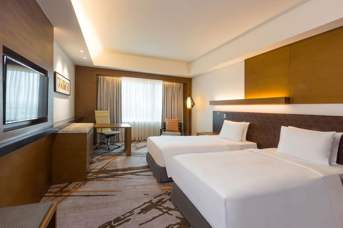 Premium bedding, down comforters, pillowtop beds, minibar