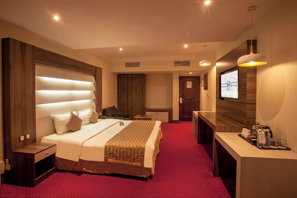 Deluxe Double Room | 1 bedroom, minibar, in-room safe, desk