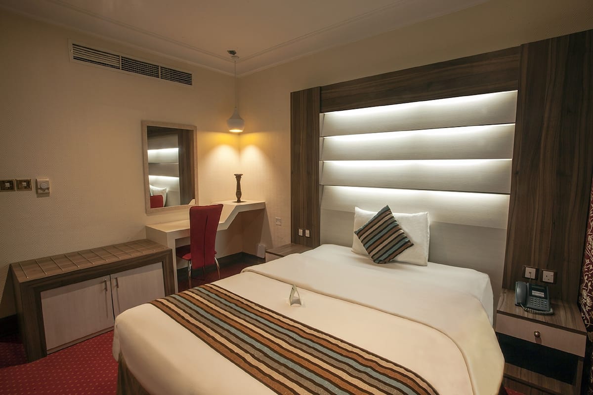 Kamar Single Deluks | 1 kamar tidur, minibar, brankas, dan meja kerja