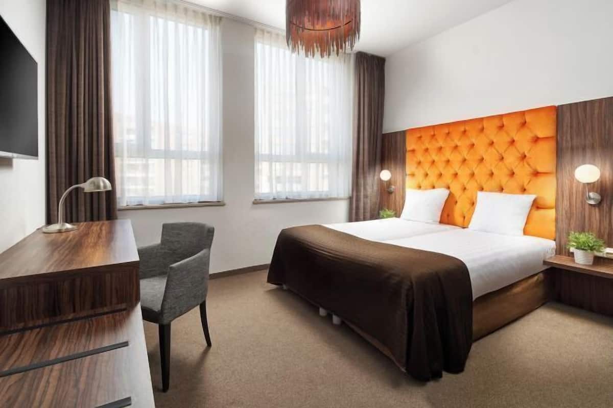 Couette en duvet d'oie, coffres-forts dans les chambres, bureau