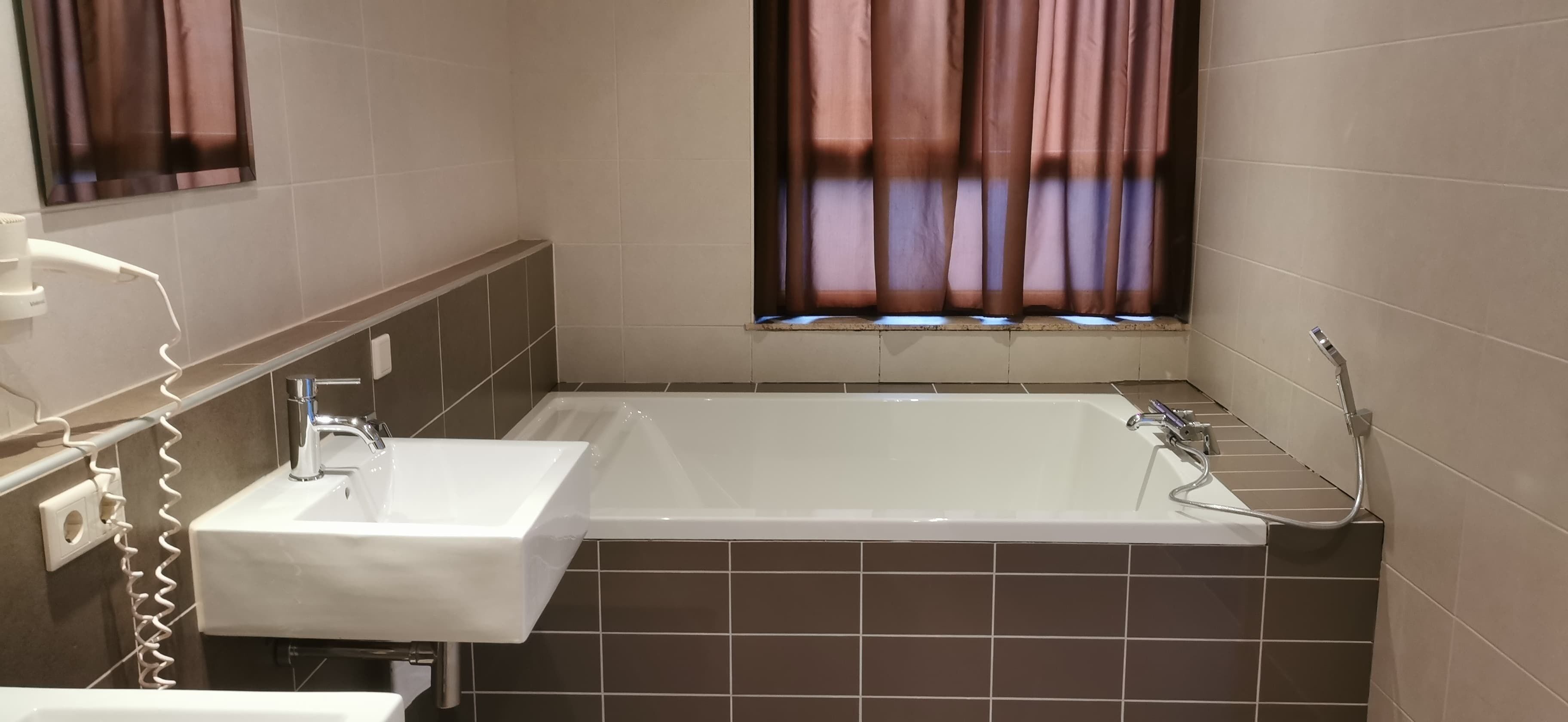 superior double room | bathroom | free toiletries, hair dryer, towels