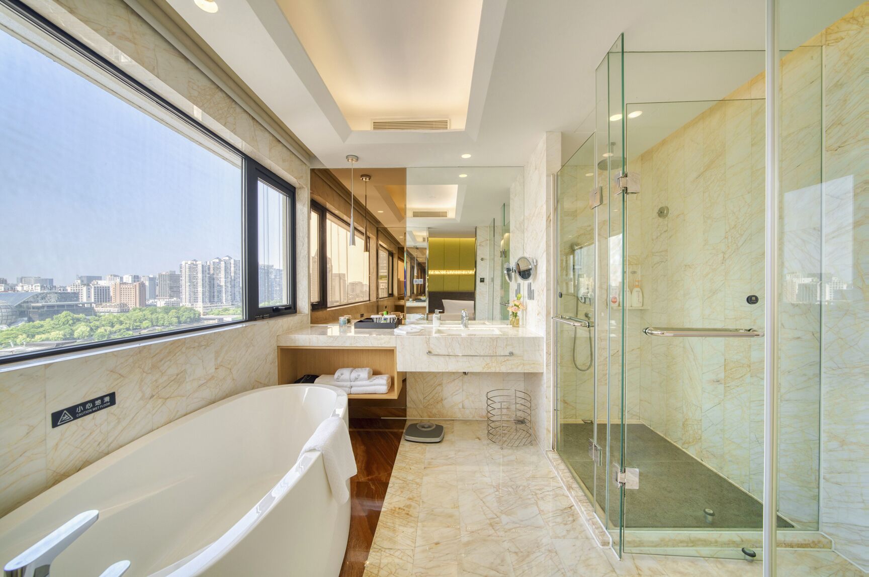 deluxe twin room | bathroom | separate bathtub and shower, rainfall showerhead, hair dryer, bathrobes