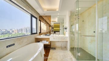 Deluxe Twin Room | Bathroom | Separate tub and shower, rainfall showerhead, hair dryer, bathrobes