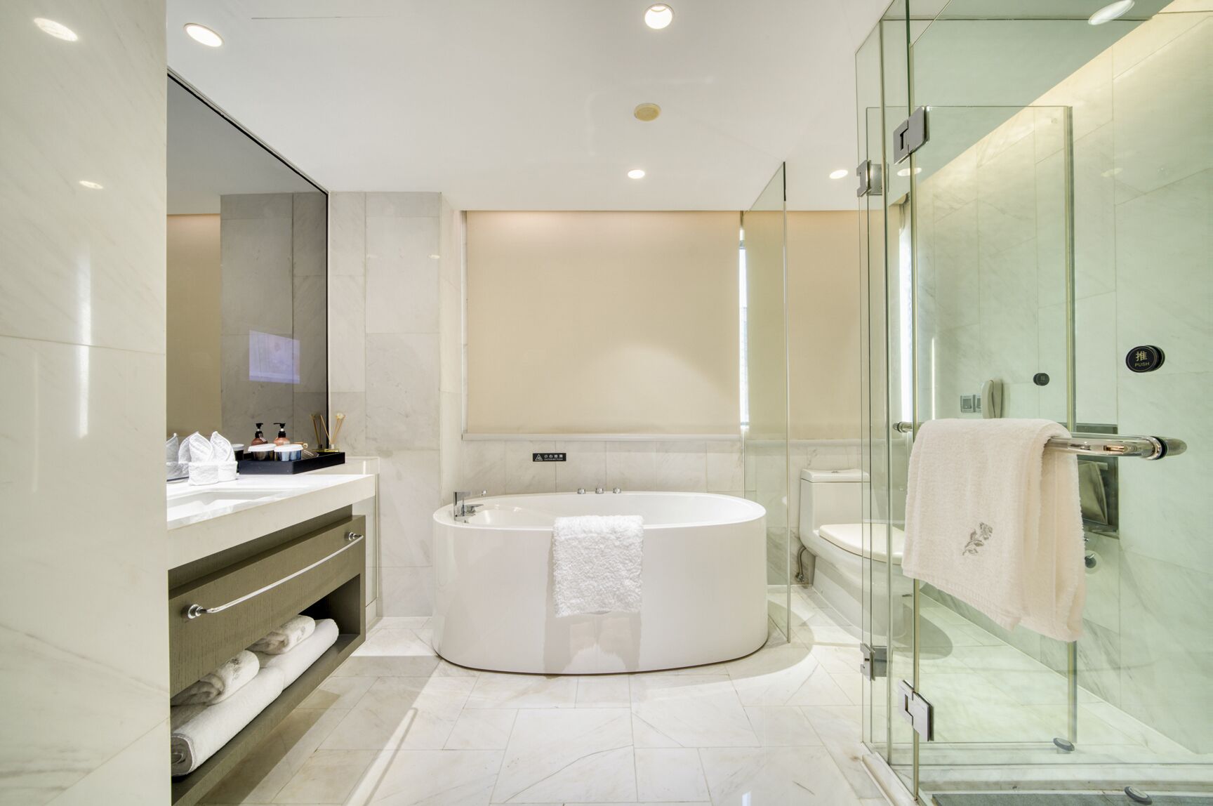 executive suite | bathroom | separate bathtub and shower, rainfall showerhead, hair dryer, bathrobes