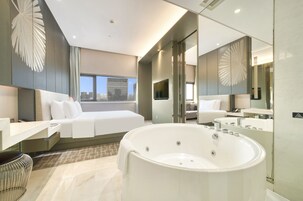 Executive Room | Bathroom | Separate bathtub and shower, rainfall showerhead, hair dryer, bathrobes