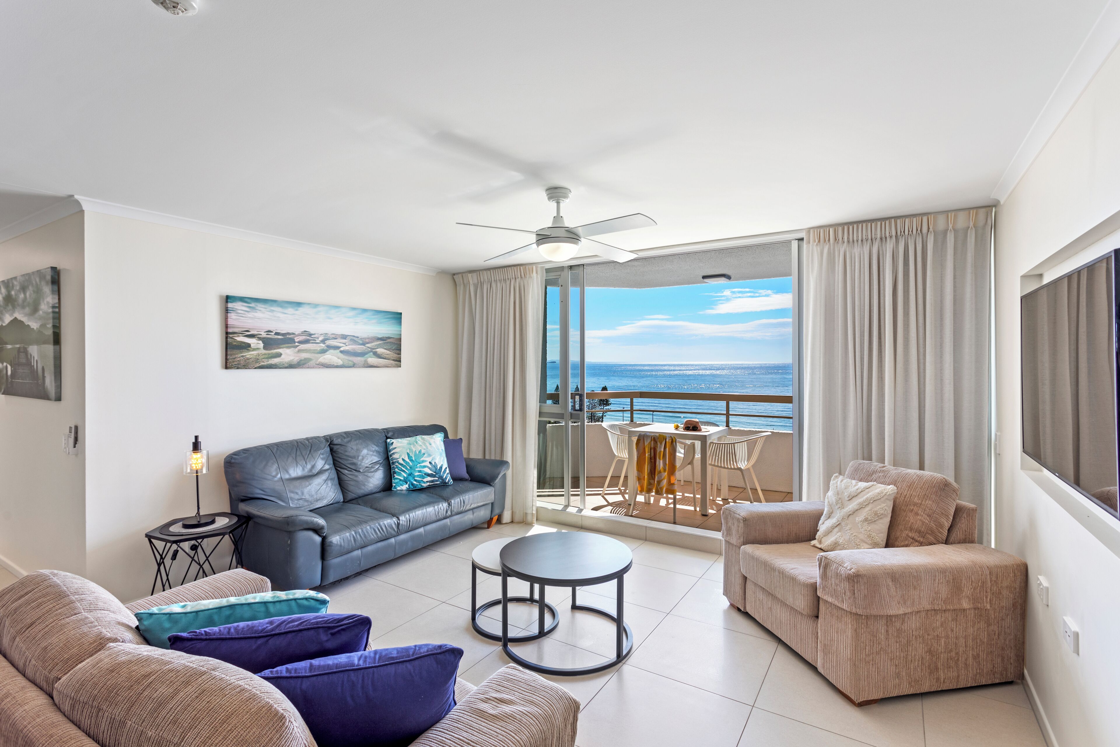 panoramic apartment, 1 bedroom, ocean view | living area | tv, offices