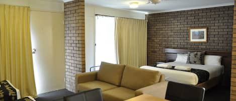 Deluxe Room, Non Smoking, Kitchenette (Deluxe Family) | Blackout drapes, iron/ironing board, free cribs/infant beds, free WiFi