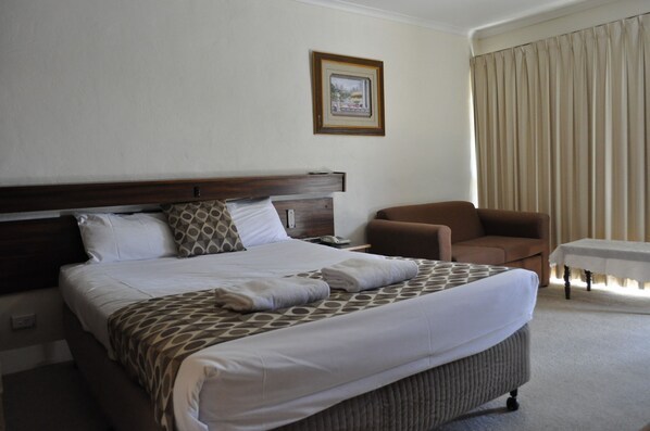 Standard Room, Non Smoking (Standard Queen) | Blackout drapes, iron/ironing board, free cribs/infant beds, free WiFi
