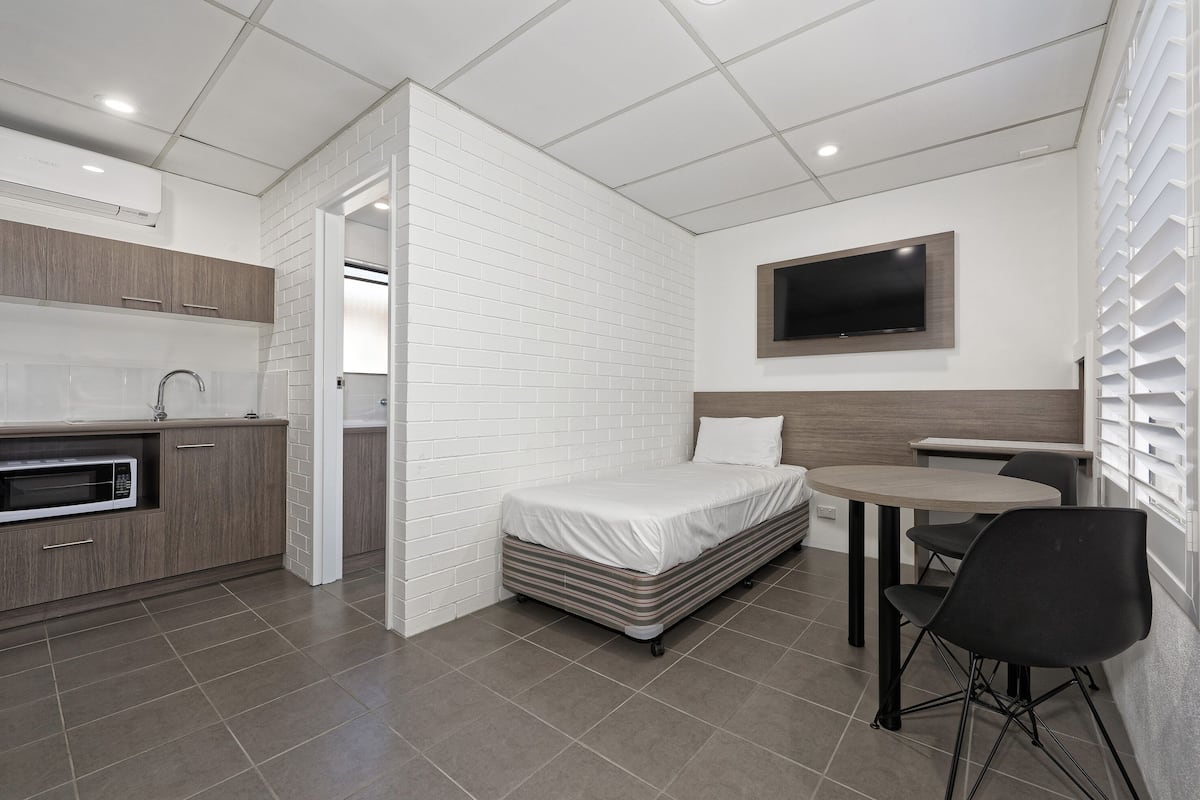 Deluxe Family Room (Pet Friendly) | Living area | TV