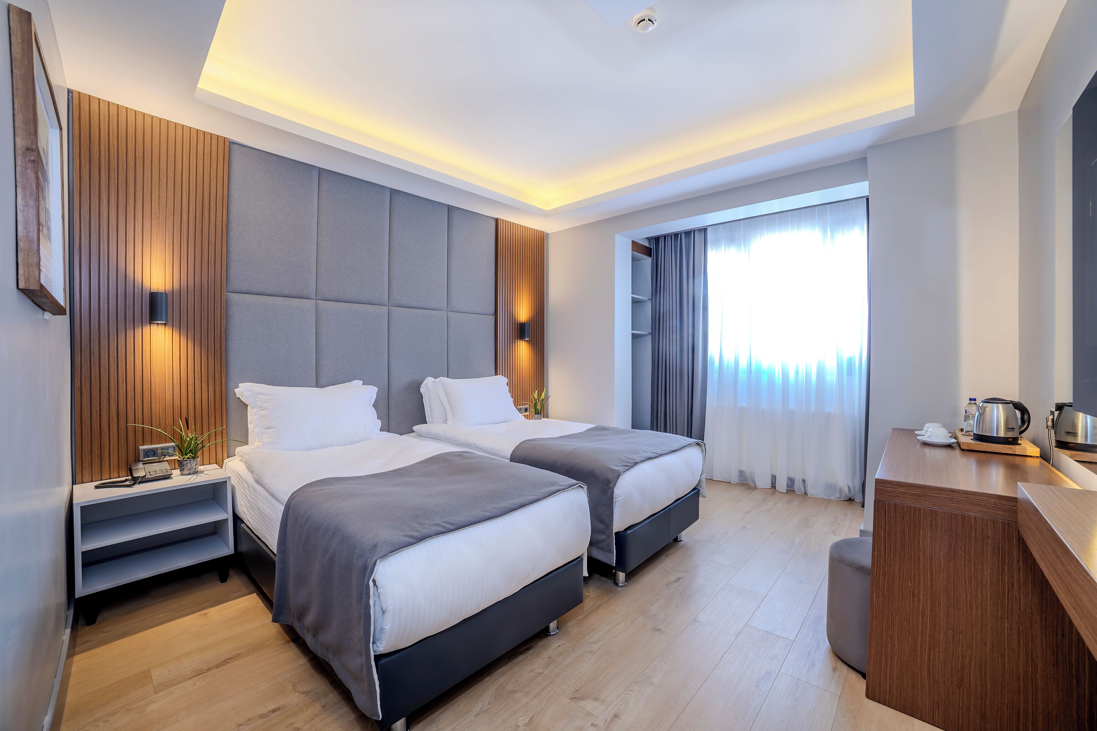 Superior Twin Room | Minibar, in-room safe, desk, laptop workspace