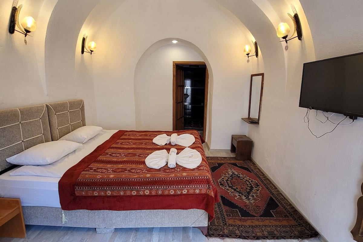 Ropa de cama de alta calidad y tabla de planchar con plancha