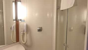 Shower, eco-friendly toiletries, hair dryer, towels
