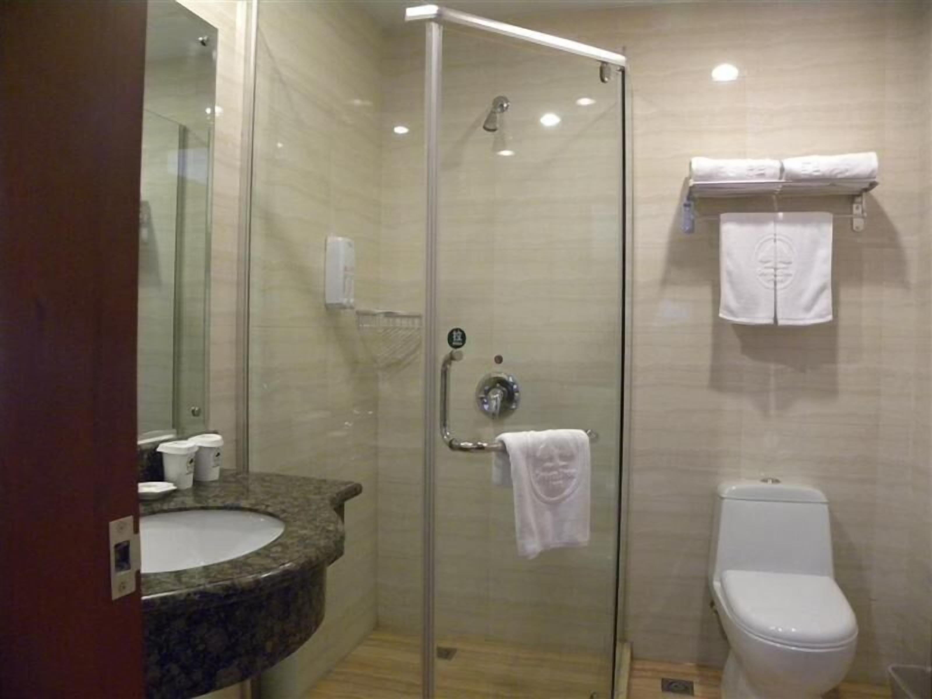 Shower, free toiletries, hair dryer, slippers