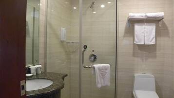 Shower, free toiletries, hair dryer, slippers