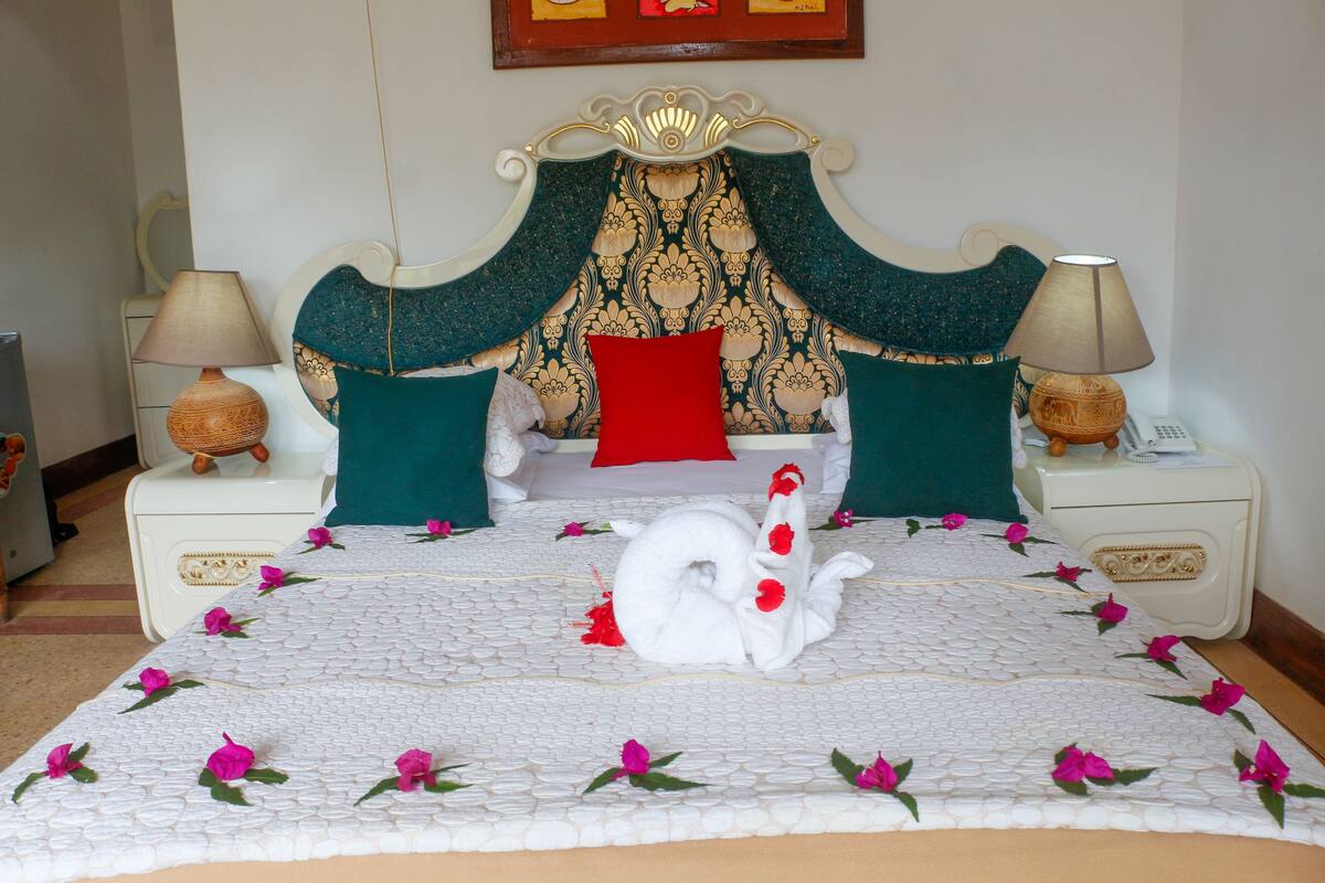 Upstairs or Down Stairs Sea or Pool facing Room | Minibar, desk, blackout drapes, iron/ironing board (on request)