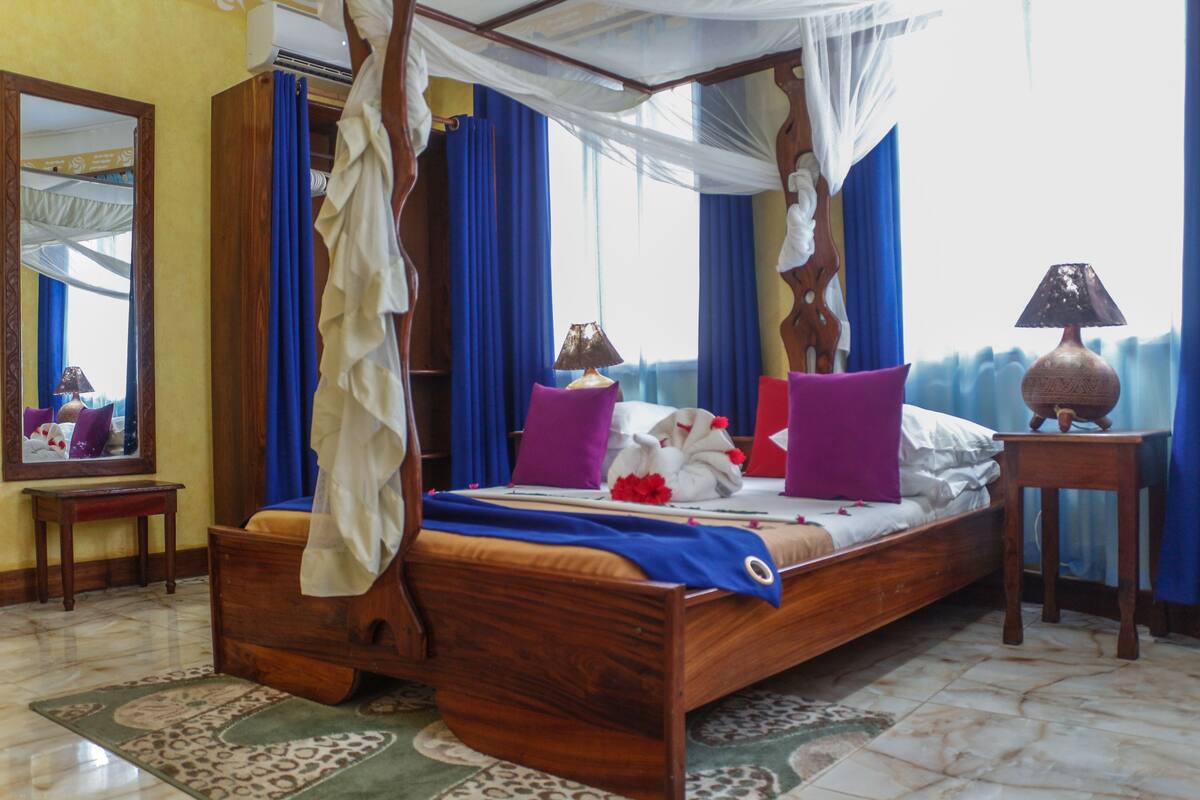 Comfortable Garden View Room | Minibar, desk, blackout drapes, iron/ironing board (on request)