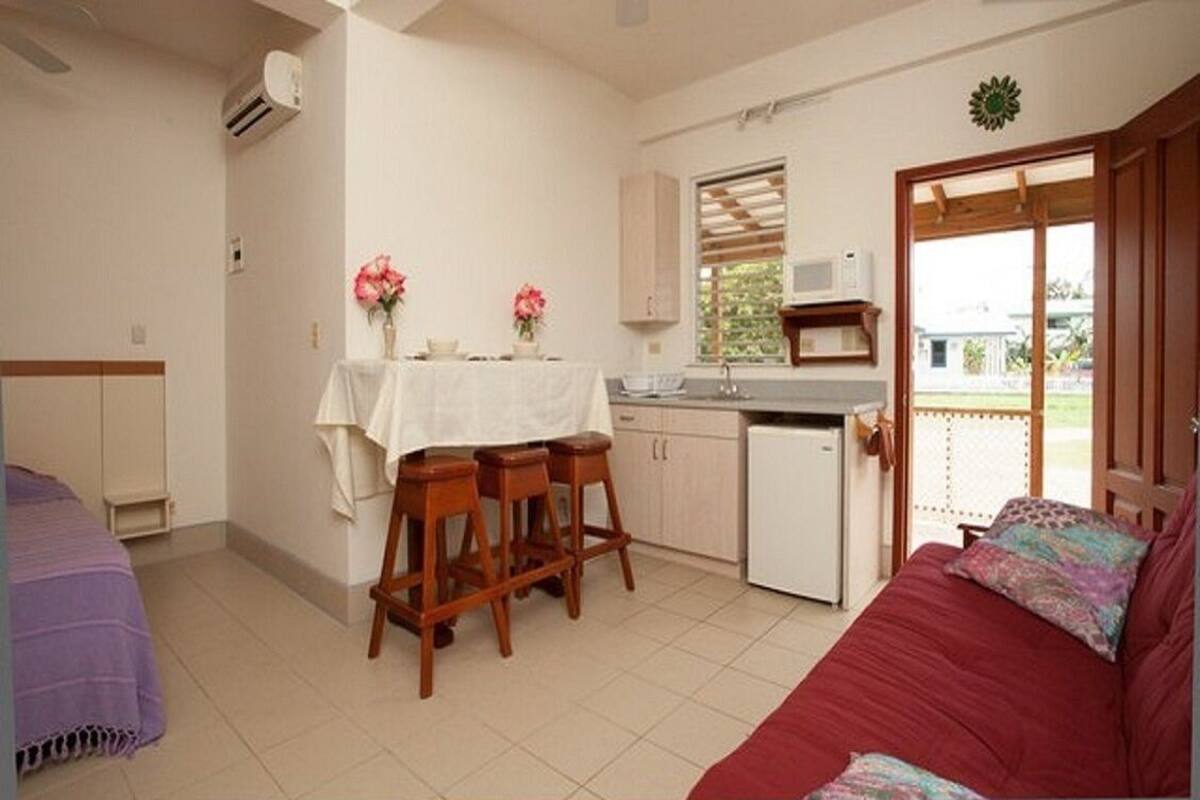 Standard Room, Accessible, Refrigerator & Microwave | Living area | 22-inch plasma TV with cable channels, TV