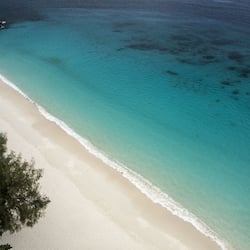 Private beach, white sand, sun loungers, beach towels
