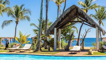 Outdoor pool, pool umbrellas, sun loungers