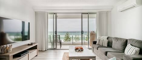 Deluxe Apartment, 2 Bedrooms | Living area | 45-inch flat-screen TV with cable channels, TV, streaming services