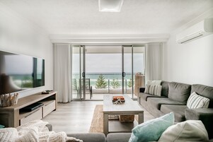 Deluxe Apartment, 2 Bedrooms | Living area | 45-inch flat-screen TV with cable channels, TV, streaming services