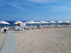 Private beach, sun loungers, beach umbrellas, beach bar