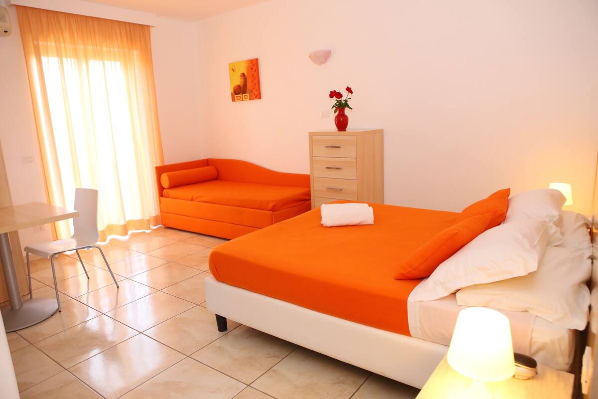 Triple Room | Premium bedding, down comforters, pillowtop beds, desk