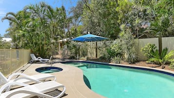 Outdoor pool, open 7:30 AM to 8:30 PM, pool loungers