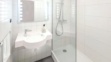 Premium bedding, desk, blackout curtains, soundproofing