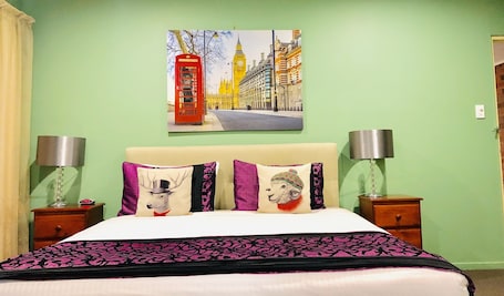 Deluxe Room, 1 King Bed | 1 bedroom, desk, iron/ironing board, free WiFi