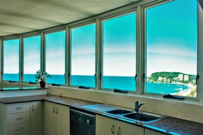 Full-sized fridge, microwave, oven, stovetop - Indigo Blue Beachfront Apartments (Burleigh Heads)