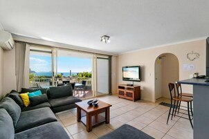 Apartment, 2 Bedrooms, Ocean View | Living area | Flat-screen TV